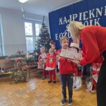chłopiec z dyplomem.jpeg